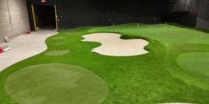 A professional Celebrity Greens signature installation at Sweet Spot Golf, the premier Wisconsin indoor putting greens facility.